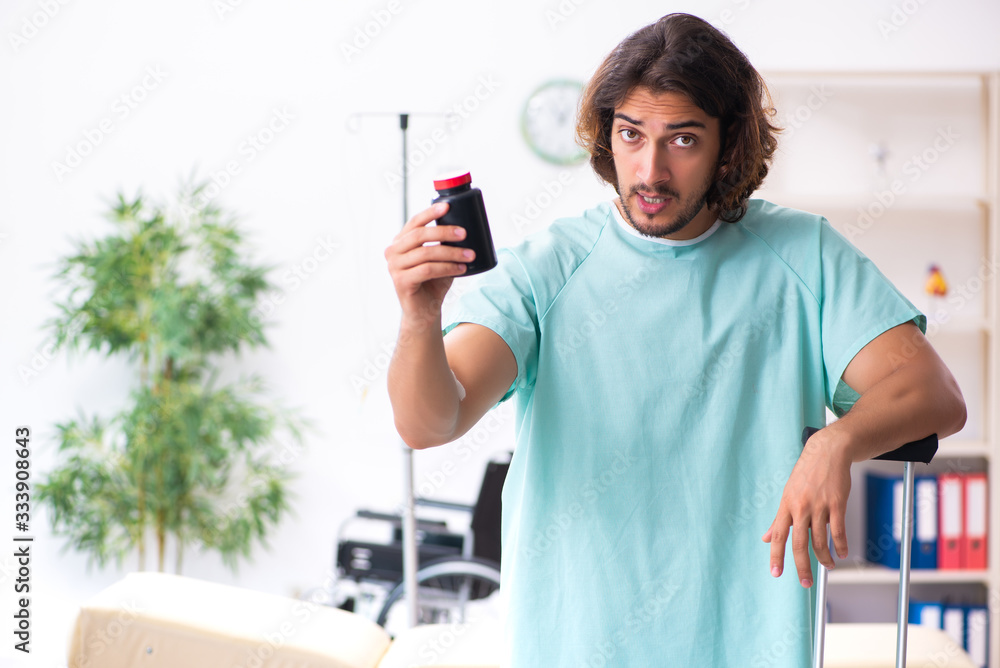 Young male patient in blood transfusion concept Young male patient in blood transfusion concept