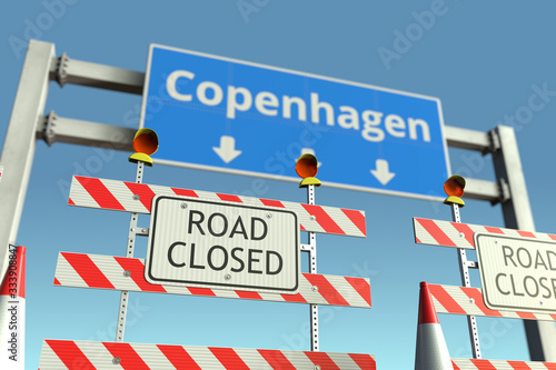 Barriers near Copenhagen city traffic sign. Coronavirus disease quarantine or lockdown in Denmark conceptual 3D rendering © Alexey Novikov