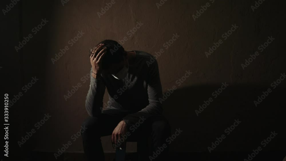 Corona Virus. COVID 19. A guy wearing the mask and feeling really lonely, disappointed, angry and hopeless. Corona Virus. COVID 19. A guy wearing the mask and feeling really lonely, disappointed, angry and hopeless.