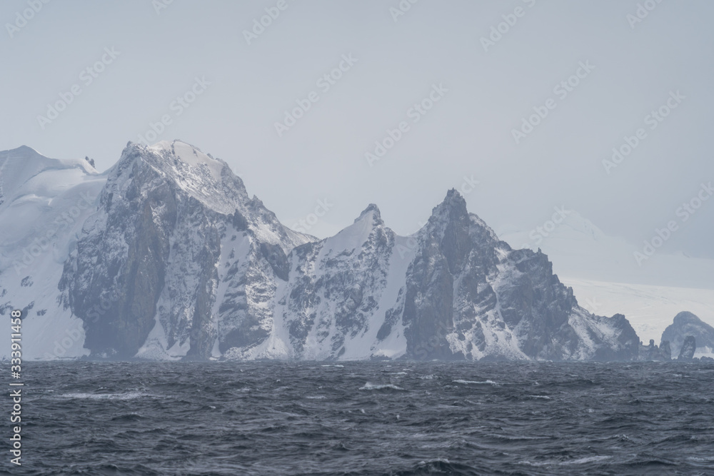 Greenwhich island as seen from the sea in Antarctica Greenwhich island as seen from the sea in Antarctica