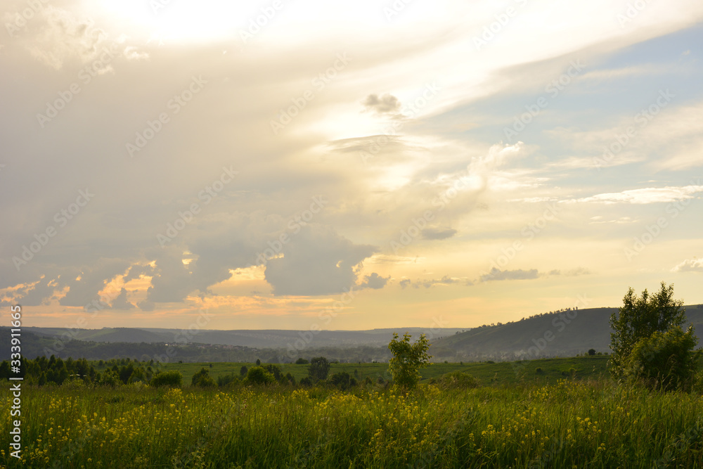 Beautiful landscape with clouds at sunset Beautiful landscape with clouds at sunset