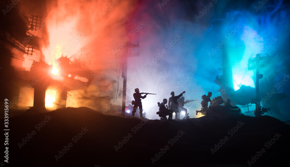War Concept. Military silhouettes fighting scene on war fog sky background, World War Soldiers Silhouette Below Cloudy Skyline At night. War Concept. Military silhouettes fighting scene on war fog sky background, World War Soldiers Silhouette Below Cloudy Skyline At night.