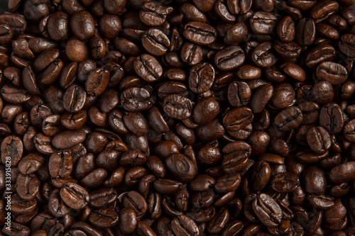 Closeup of coffee beans background, seen from above.