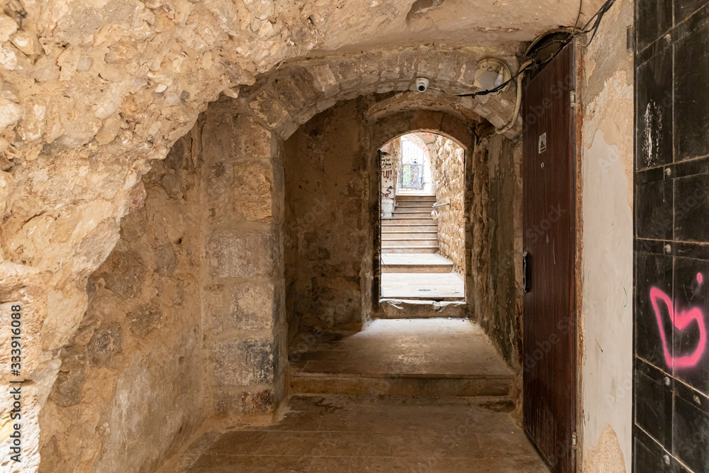 Tunnel passage between houses in the Arab region of the old city of Jerusalem in Israel