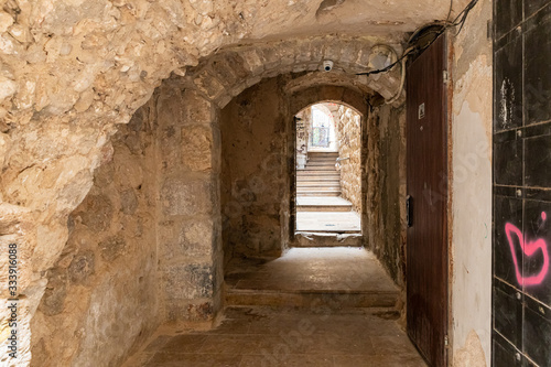 Tunnel passage between houses in the Arab region of the old city of Jerusalem in Israel