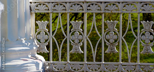 metal wrought iron white fence with flowers