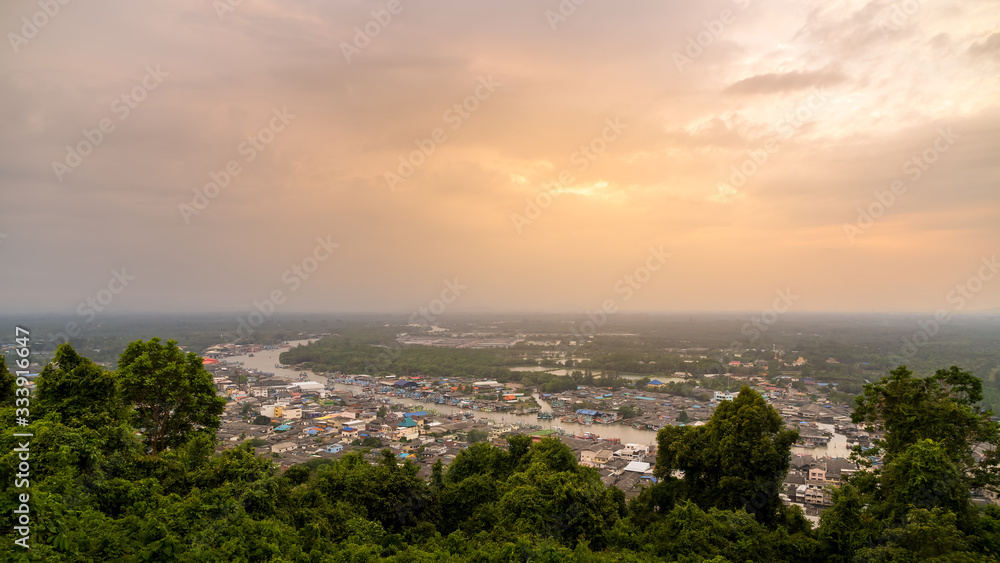 Pak Nam Chumphon town, fisherman village, and river from Khao Matsee scenic viewpoint during sunset