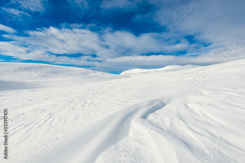 Snowdrift on mountain landscape, Norway. © Mikael