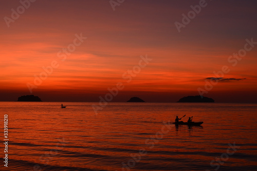 Beautiful sunset at the beach in the tropics. Sky and ocean