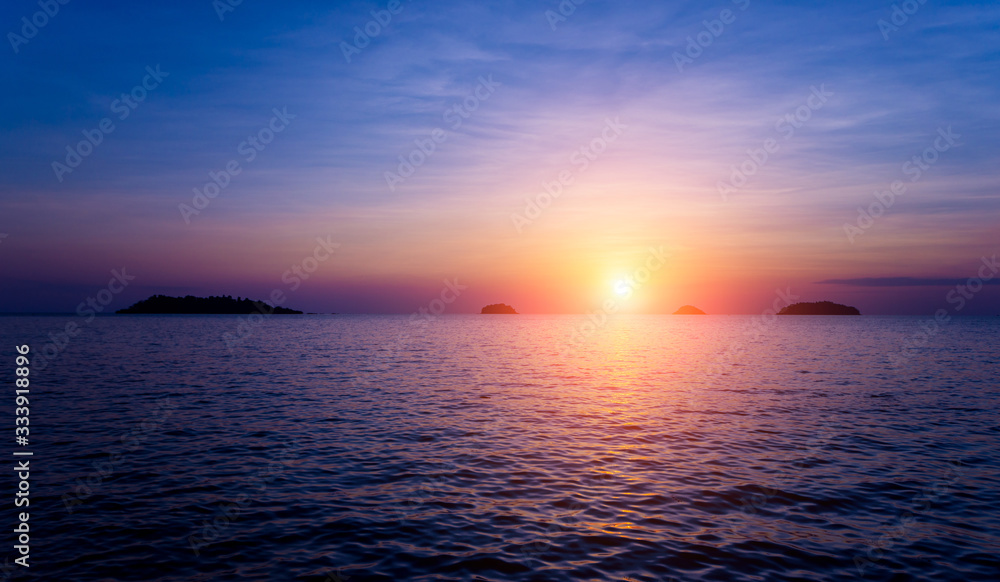 Beautiful sunset at the beach in the tropics. Sky and ocean Beautiful sunset at the beach in the tropics. Sky and ocean