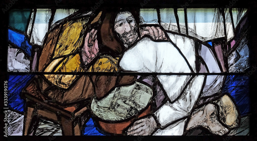 Obraz premium God begins salvation in this world through His Son Jesus Christ, detail of stained glass window by Sieger Koder in St. John church in Piflas, Germany