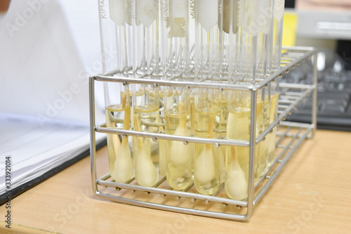 Photography laboratory microbiology bacteria agar tube in incubator quality control process