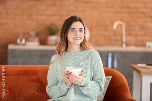 Young woman in warm sweater...