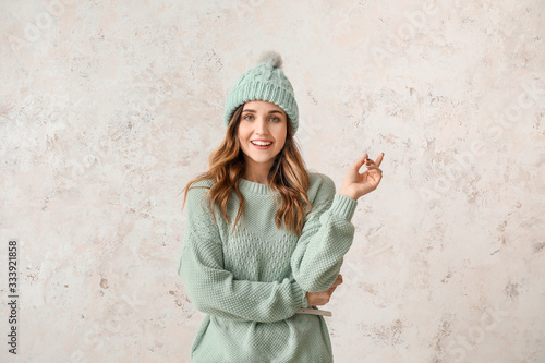 Young woman in warm sweater...