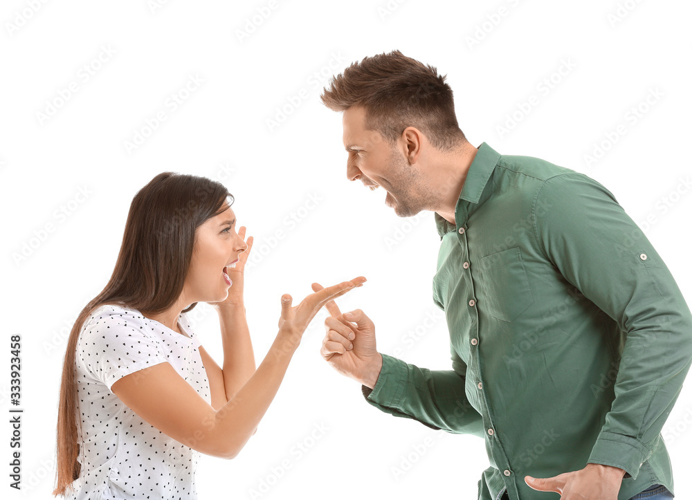 Young couple quarreling on white background Young couple quarreling on white background