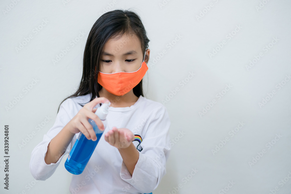 Coronavirus Covid-19 virus and Air pollution pm2.5.Asian child girl protect from virus stop coronavirus covid 19 outbreak.Child girl activity stay at home Coronavirus Covid-19 virus and Air pollution pm2.5.Asian child girl protect from virus stop coronavirus covid 19 outbreak.Child girl activity stay at home