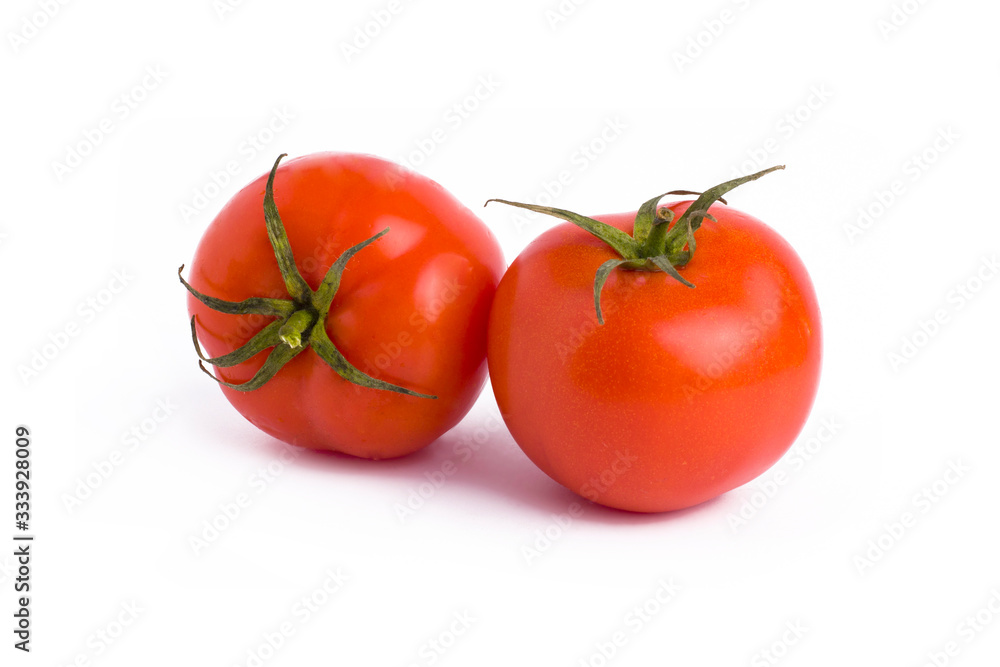 Fresh tomatoes isolated on white background. Two red ripe tomatoes isolated on white background. Tomatoes on white background. Fresh tomatoes isolated on white background. Two red ripe tomatoes isolated on white background. Tomatoes on white background.