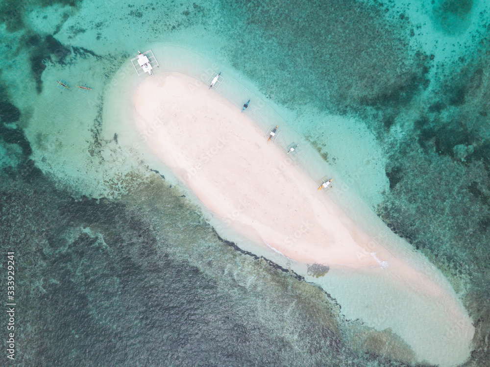 Aerial view of Naked Island, part of island hopping tour on Philippine island of Siargao