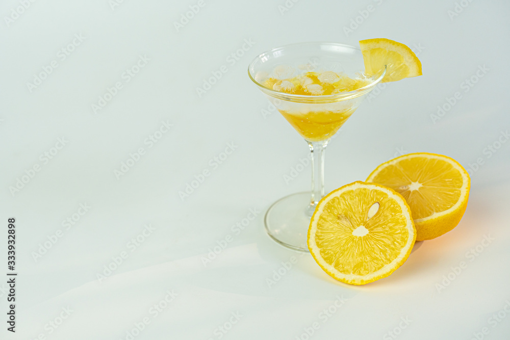 Fresh lemon soda drink iced with lemon sliced on white background.