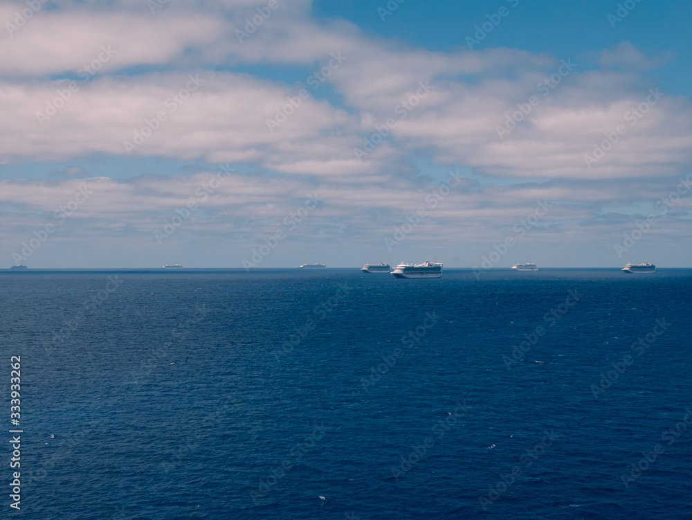 Bimini, Bahamas - March 28, 2020: cruise ships on quarantine COVID-19 at the ocean at sunny weather Bimini, Bahamas - March 28, 2020: cruise ships on quarantine COVID-19 at the ocean at sunny weather