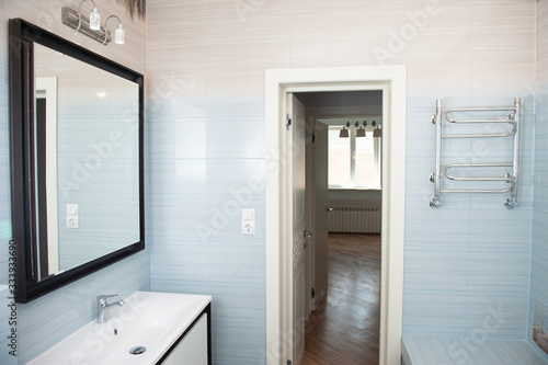 clean disinfect bathroom with opened door in house home