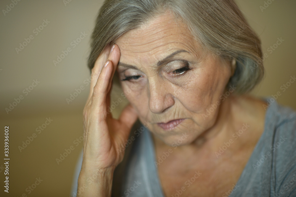 Portrait of beautiful senior woman with headache Portrait of beautiful senior woman with headache