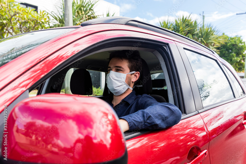 Young driver with face mask Young driver with face mask