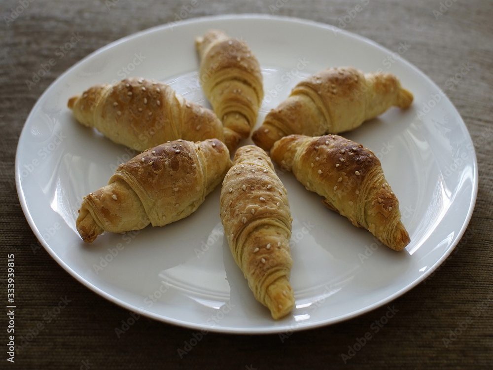 Small rolls croissants no white plate star shape Small rolls croissants no white plate star shape