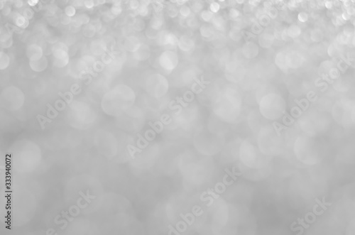 abstract white blur bokeh glitter sparkle no color background. © thithawat