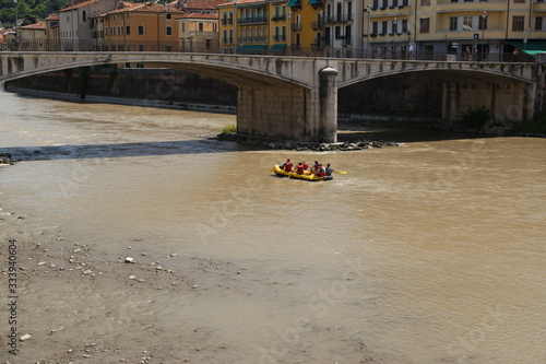 Verona - Adige panorama and rafts on the Adige.