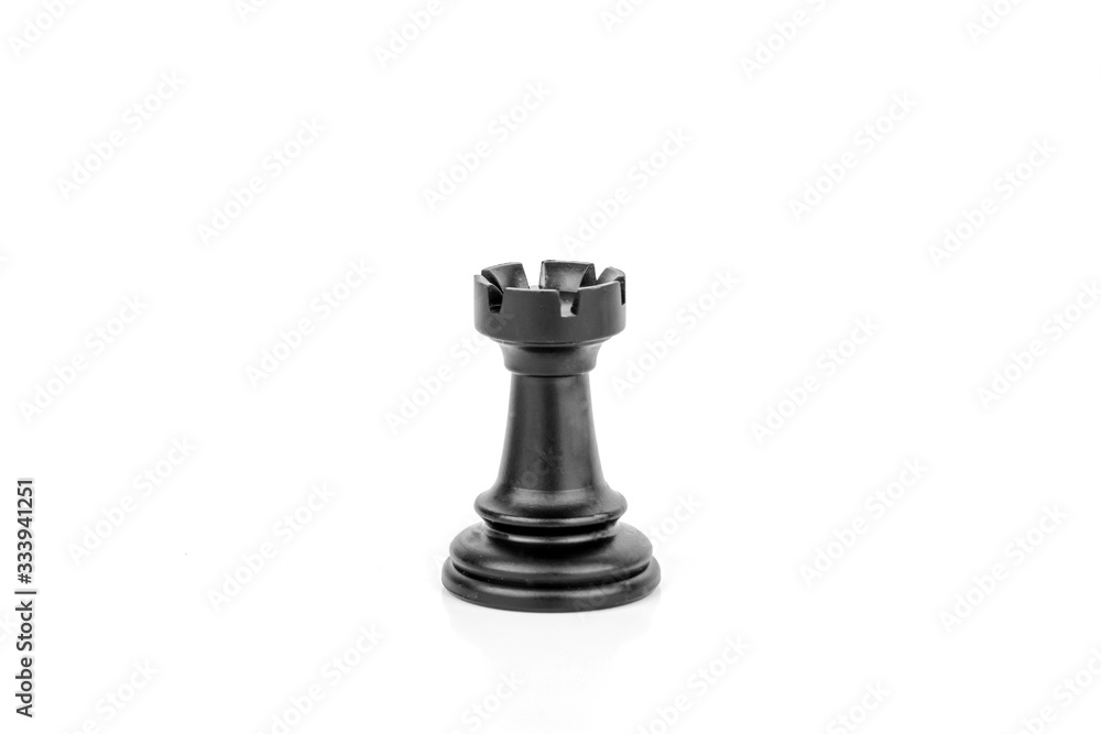 Black rook chess piece isolated on white background. The concept of board games, logic, training for the brain.