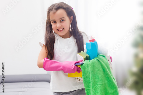 Little housekeeping fairy girl doing home chores