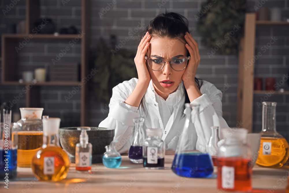 Crazy alchemist working in laboratory Crazy alchemist working in laboratory