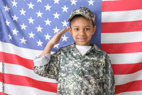 Little saluting African-Ame...