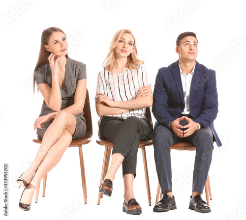 Young business people waiti...