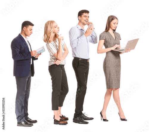 Young business people waiti...