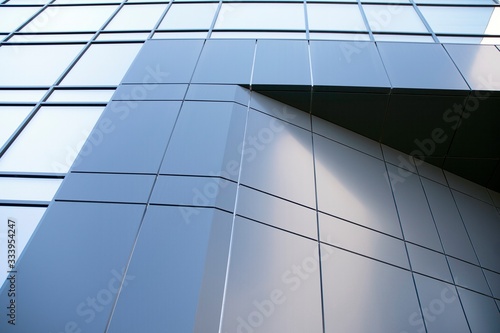 Abstract texture and blue glass facade in modern office building. 