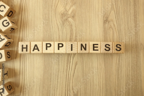 Word happiness from wooden blocks