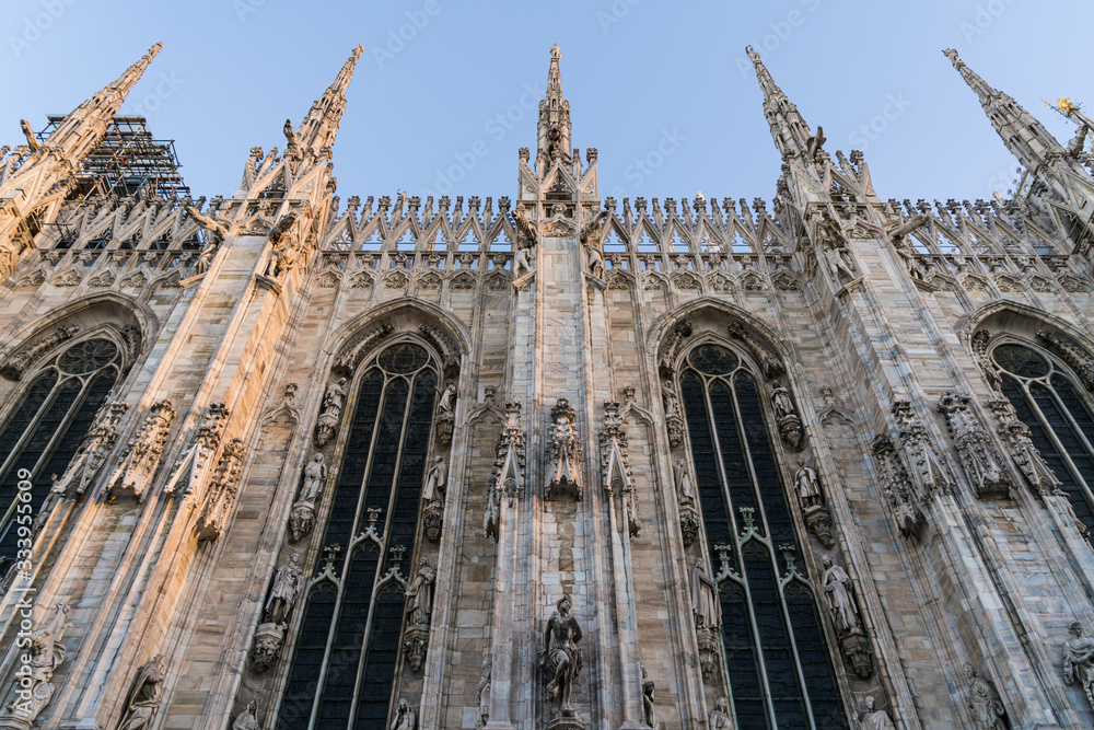 Architecture detail of Duomo di Milano church in the morning, Milan Italy