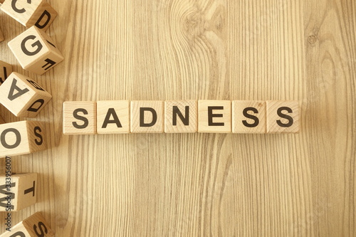 Word sadness from wooden blocks