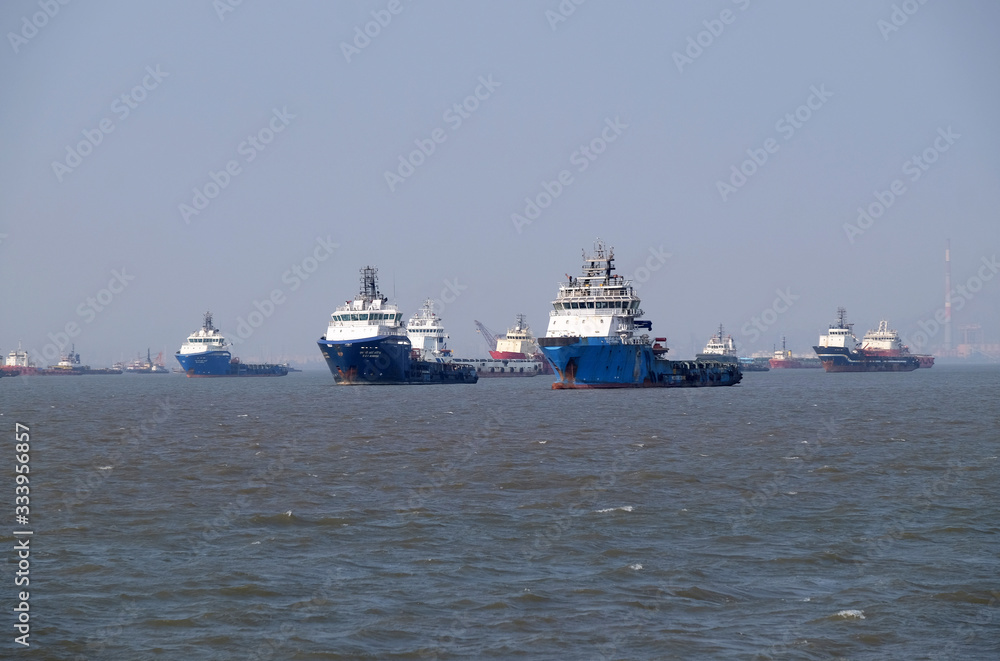 Commercial ship at anchor in the Arabian Sea outside Mumbai, India