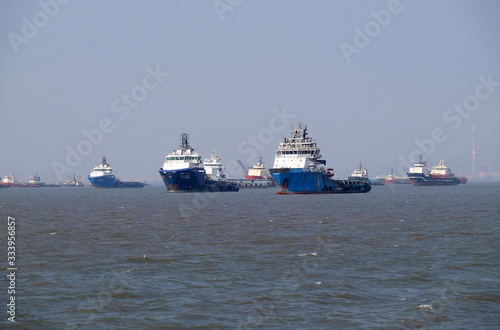 Commercial ship at anchor in the Arabian Sea outside Mumbai  India