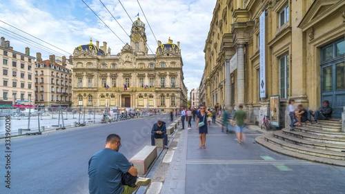 The Place des Terreaux is a square located in the center of Lyon, France on the Presqu'île between the Rhône and the Saône. Lyon france time lapse hyperlpase view of city traffic. photo