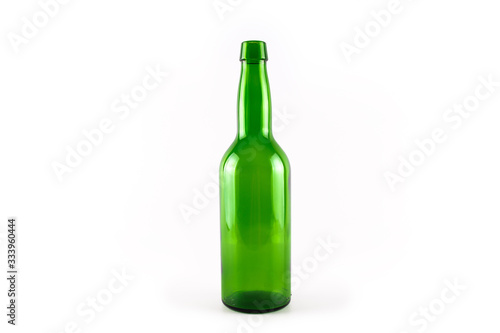 Empty green bottle. Empty beer bottle.