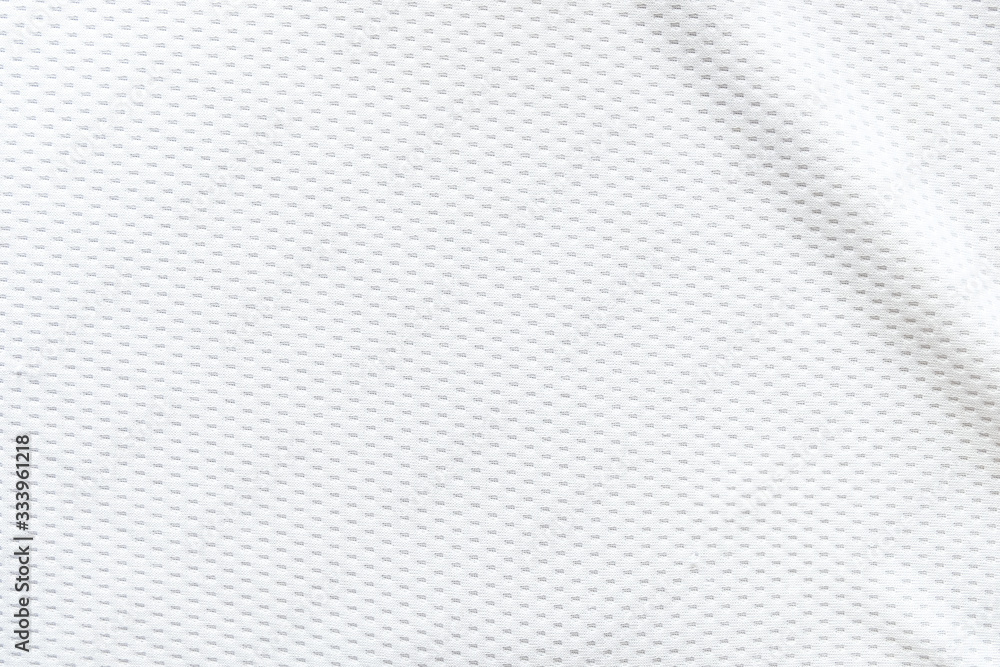 Selective focus, White mesh fabric background. cloth sport wear texture for exercise. light weight, good air flow, cool and easy to dry from sweat. abstract wallpaper with copy space for text. Selective focus, White mesh fabric background. cloth sport wear texture for exercise. light weight, good air flow, cool and easy to dry from sweat. abstract wallpaper with copy space for text.