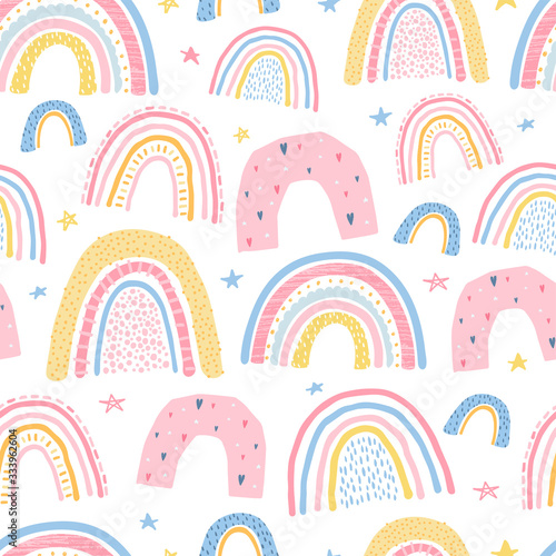 Cute, delicate seamless pattern with a rainbow on a white background in pastel color. Illustration for children's room design, Wallpaper, textiles, fabric, packaging paper. Vector