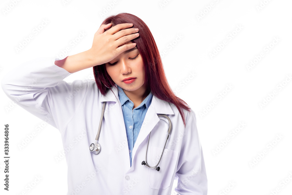 Young female doctor get headache, stressed, sleepy. Beautiful medical doctor get migraine, overworked overstressed. Professional medical doctor get sick. She wear coat stethoscope on neck. copy space Young female doctor get headache, stressed, sleepy. Beautiful medical doctor get migraine, overworked overstressed. Professional medical doctor get sick. She wear coat stethoscope on neck. copy space