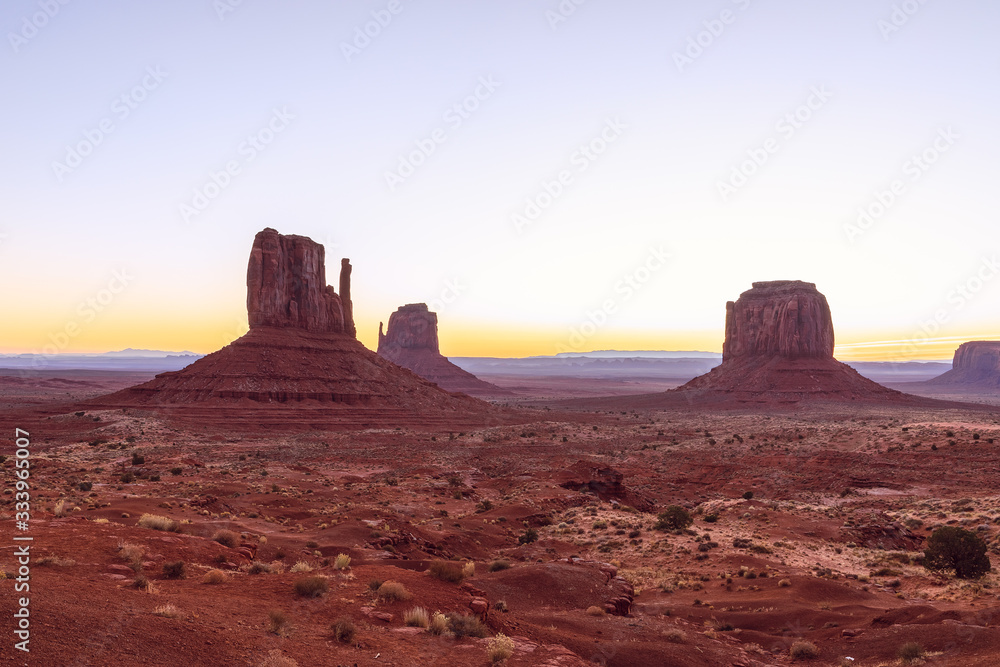 Beautiful sunrise view of famous Buttes of Monument Valley on the border between Arizona and Utah, USA