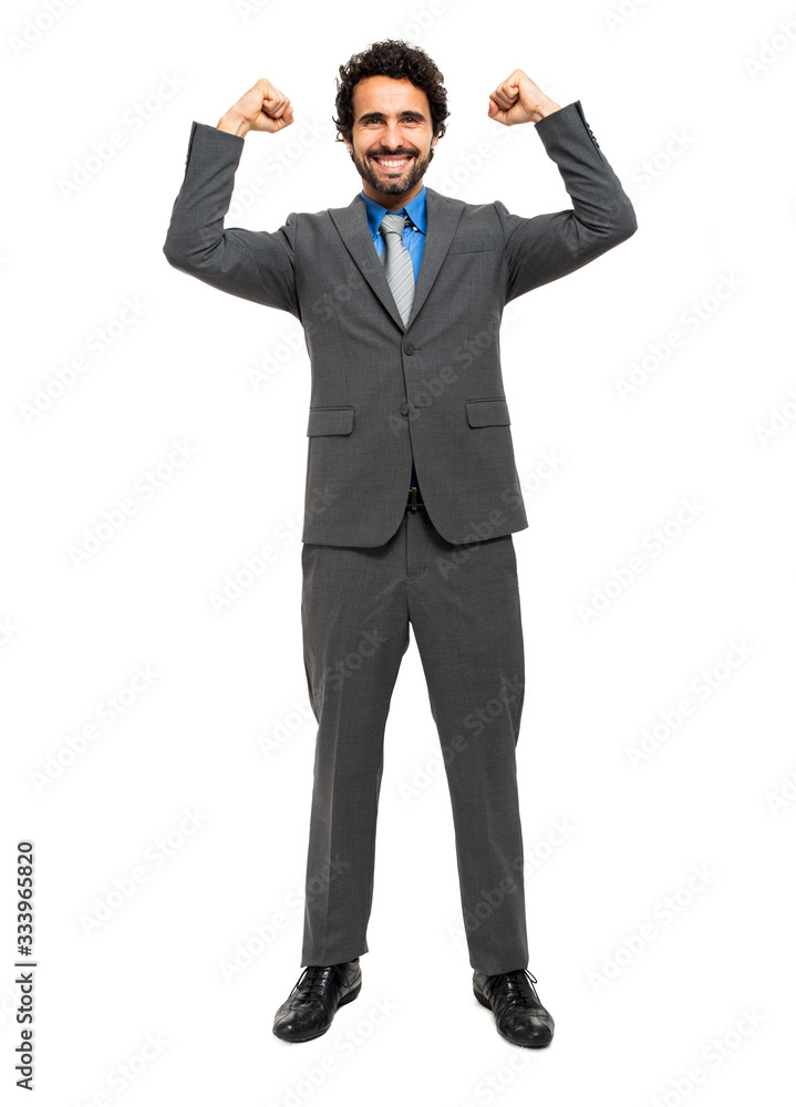 Successful business man with arms raided- isolated over a white background Successful business man with arms raided- isolated over a white background