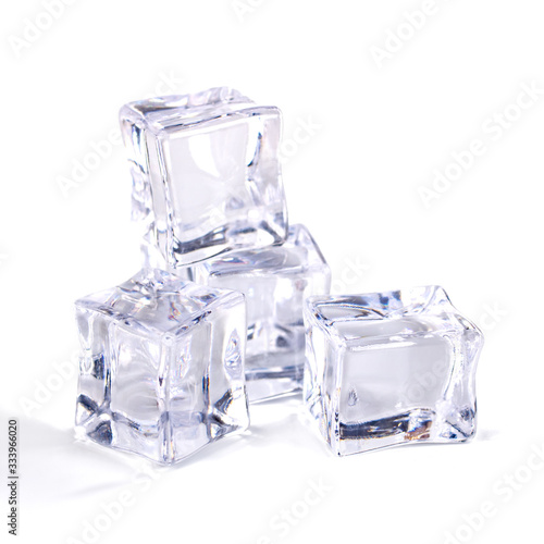 Pile of ice cubes isolated on white background